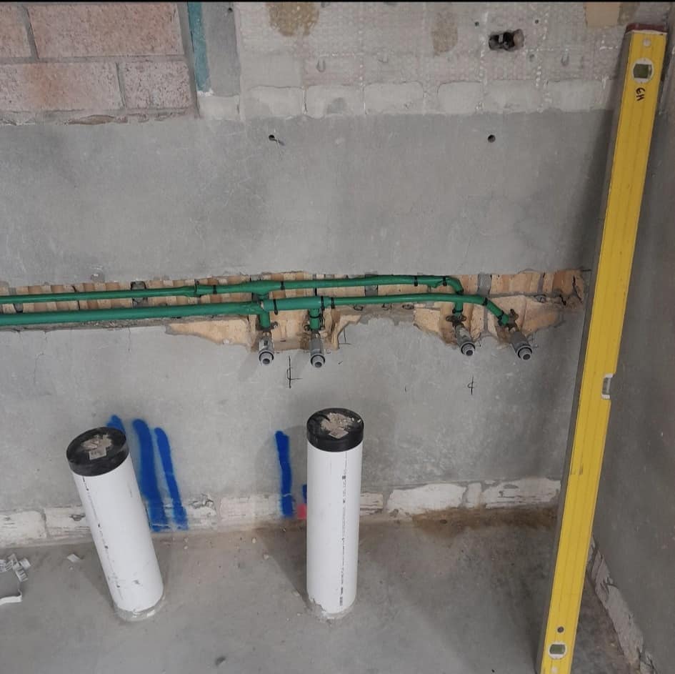 Commercial plumbing rough-in pipework installation