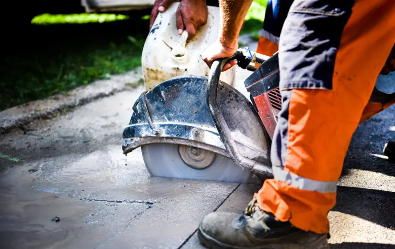 Concrete saw cutting for plumbing access