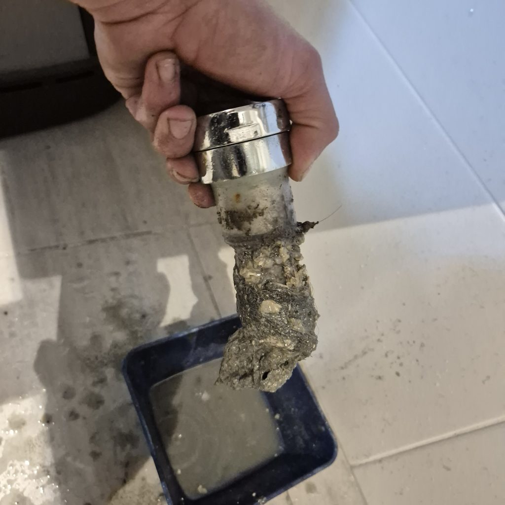 Blocked bathroom drain obstruction