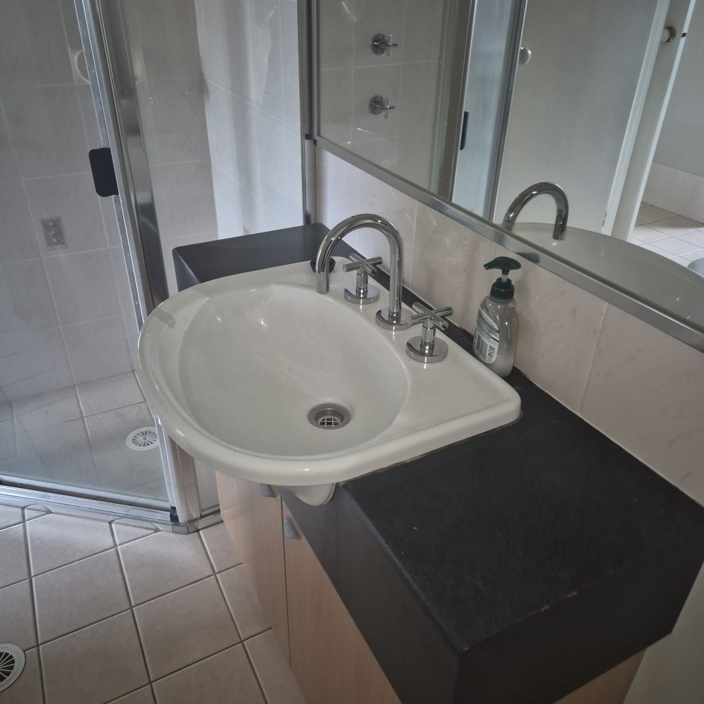 Bathroom basin and tapware installation